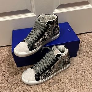 Black and white P448 38 cow hair high. Worn twice and comes with box.